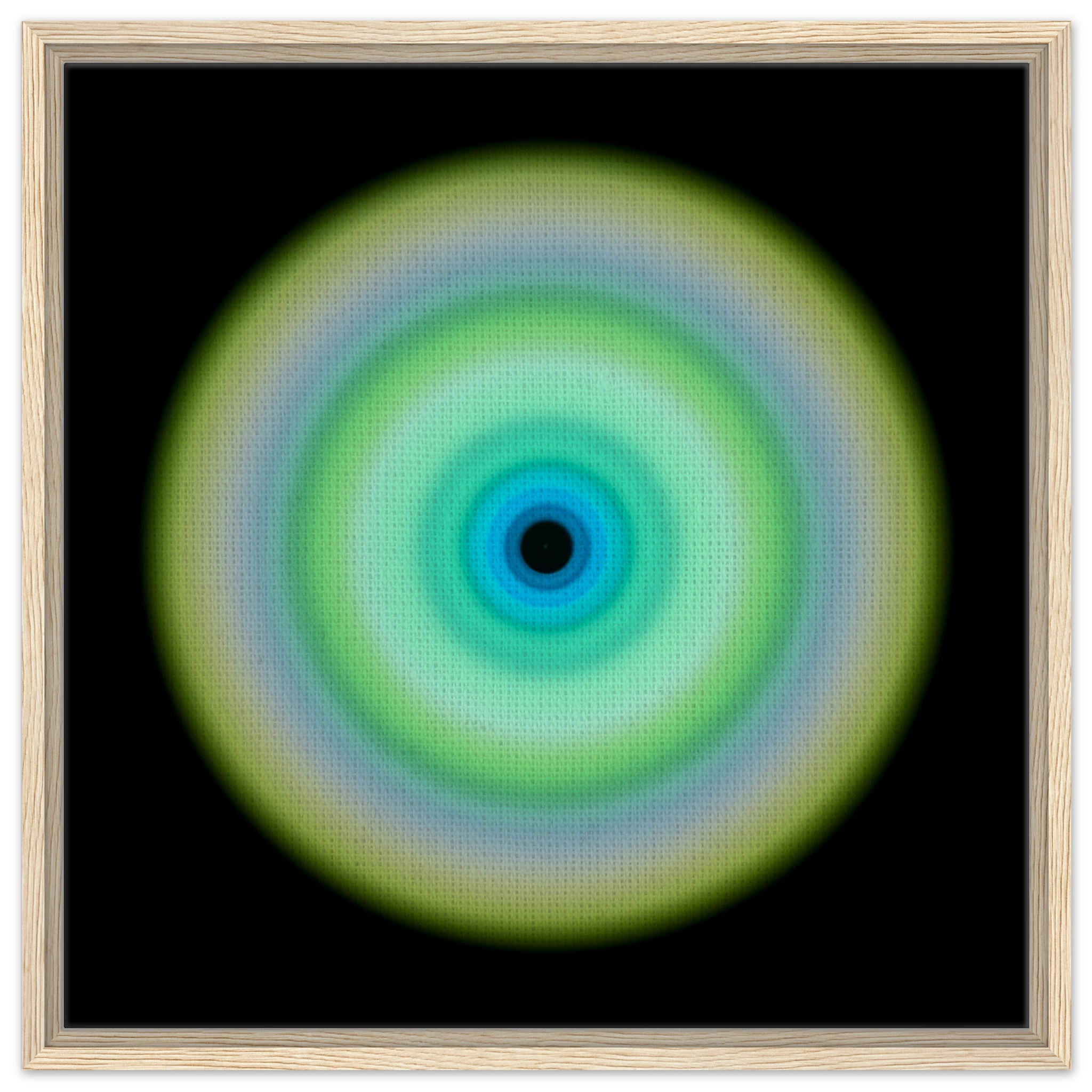 A circular form with concentric rings transitioning from pale yellow-green on the outer edge through lime green and aqua to cobalt blue around a small dark center.