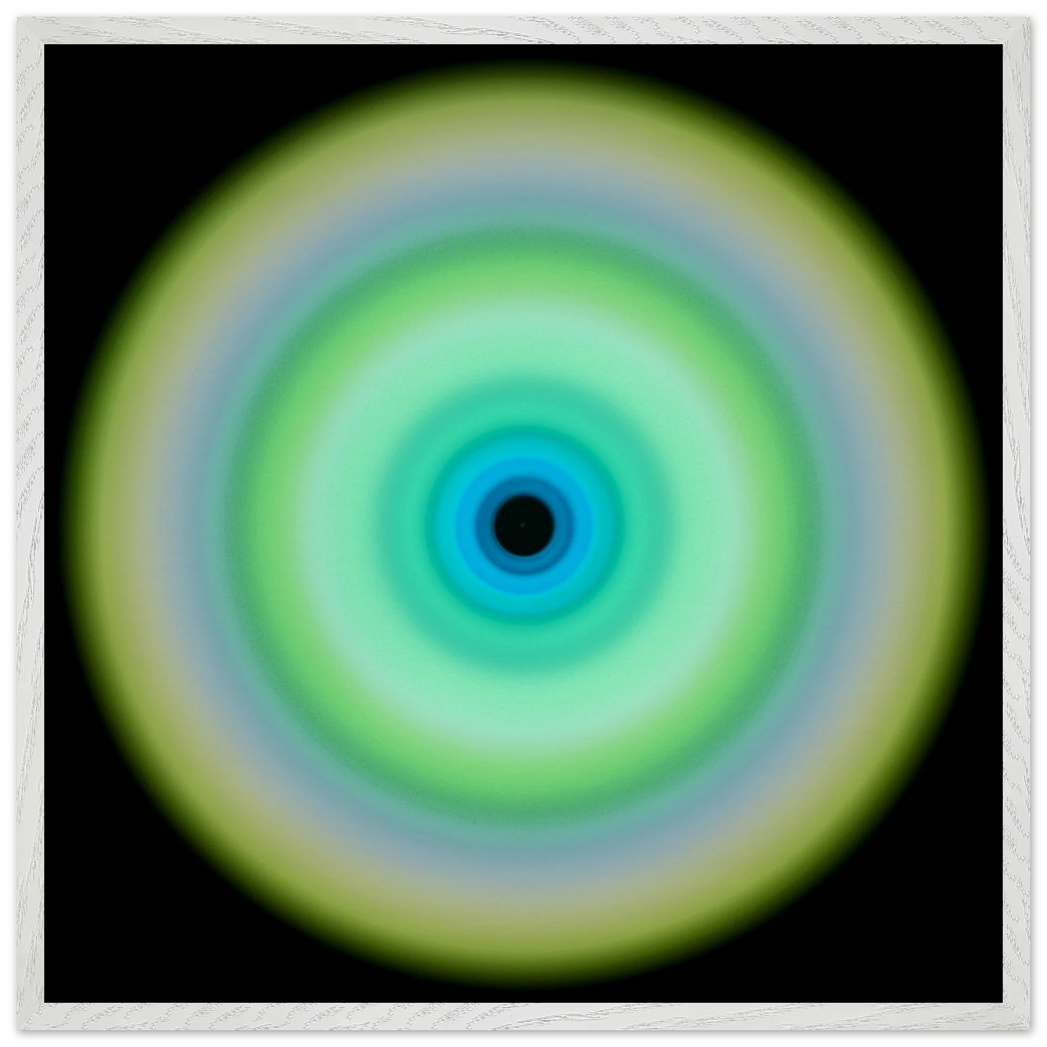 A circular form with concentric rings transitioning from pale yellow-green on the outer edge through lime green and aqua to cobalt blue around a small dark center.