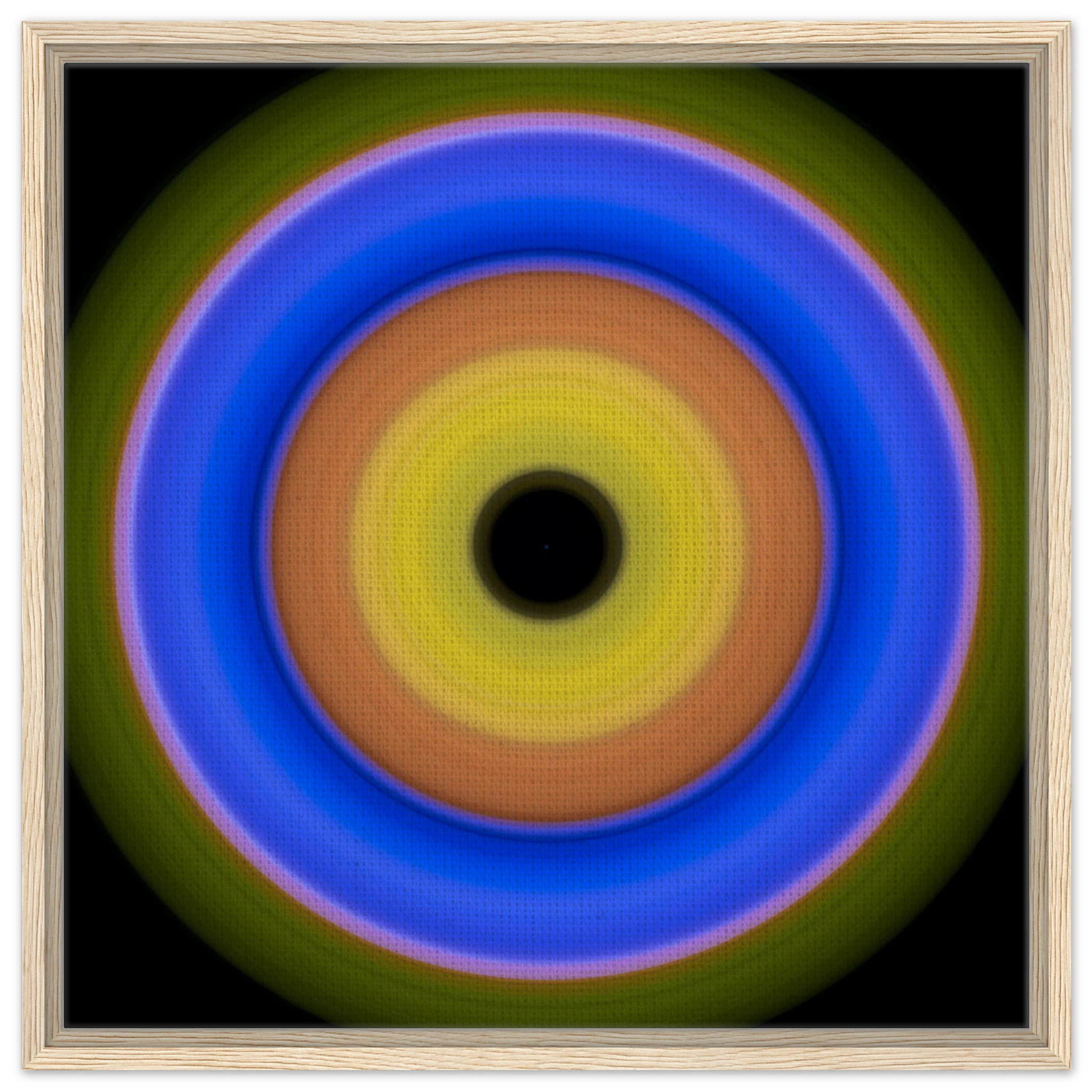A circular aperture shape with concentric color rings radiating from a black center through yellow, orange, blue, and olive green.