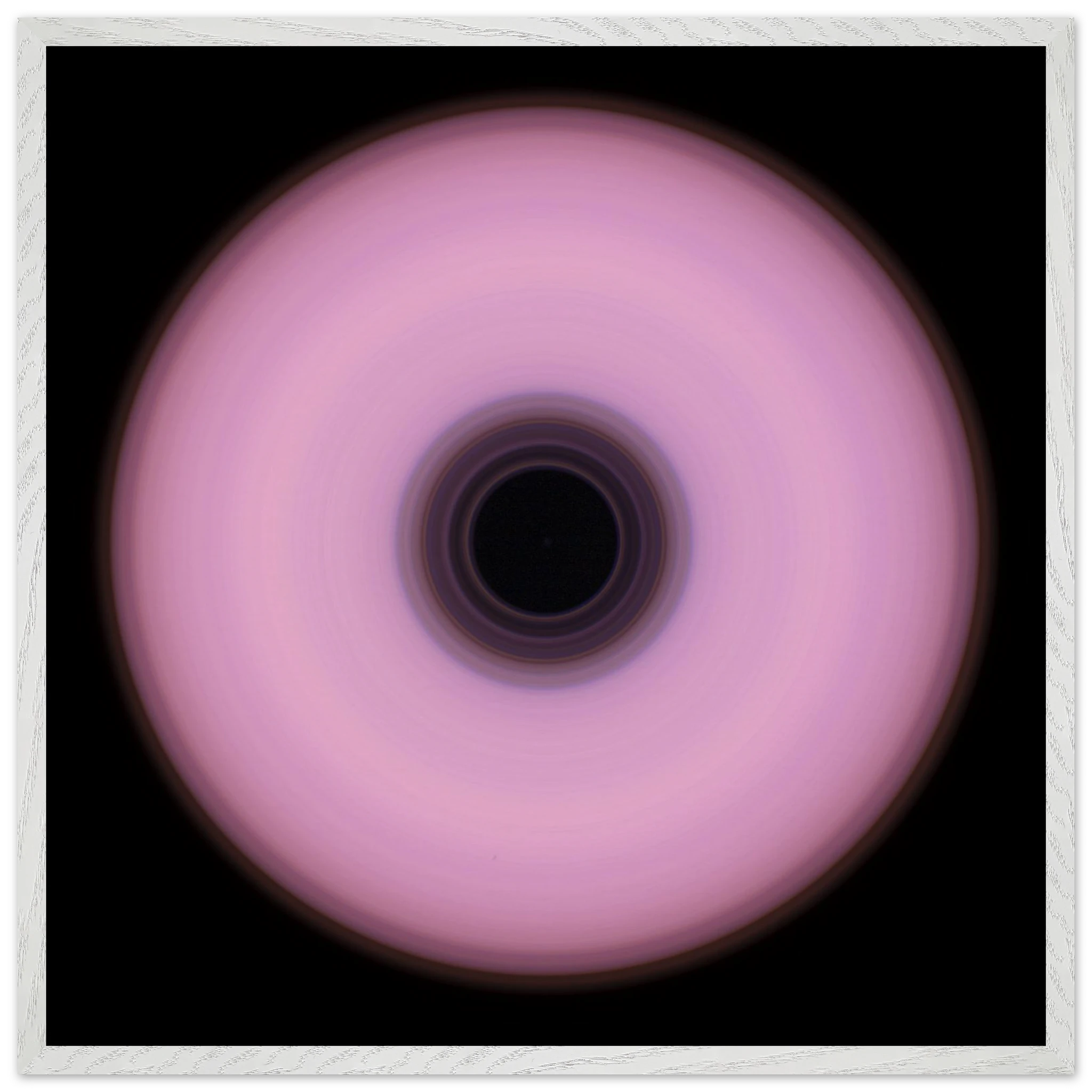 A circular ring with soft pink outer area and concentric bands in the center transitioning from deep violet to black.