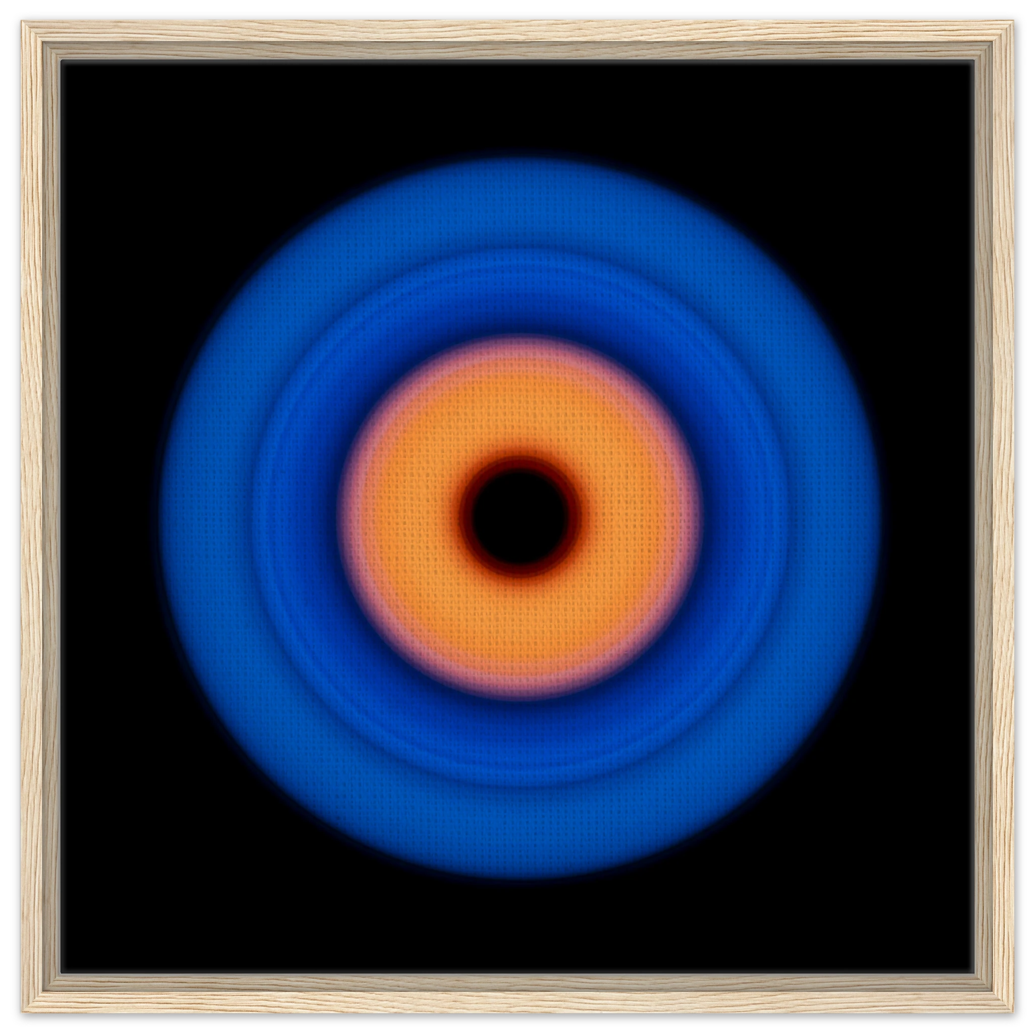 A circular ring with deep blue outer edge transitioning through purple-pink to coral orange center with a small black void in the middle.