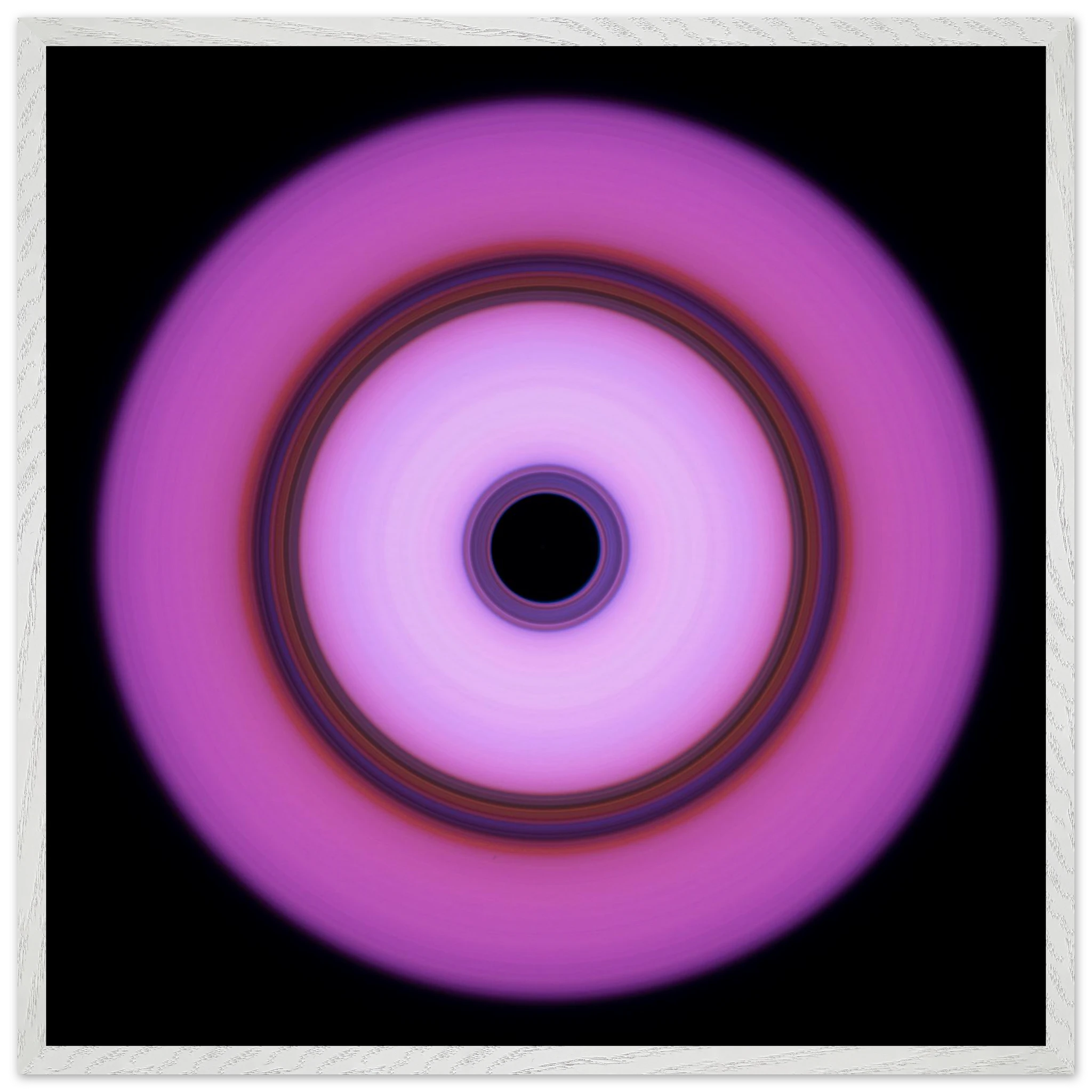 A circular form with magenta outer edges fading to white center, featuring a multicolored ring band and small black circle at the core.