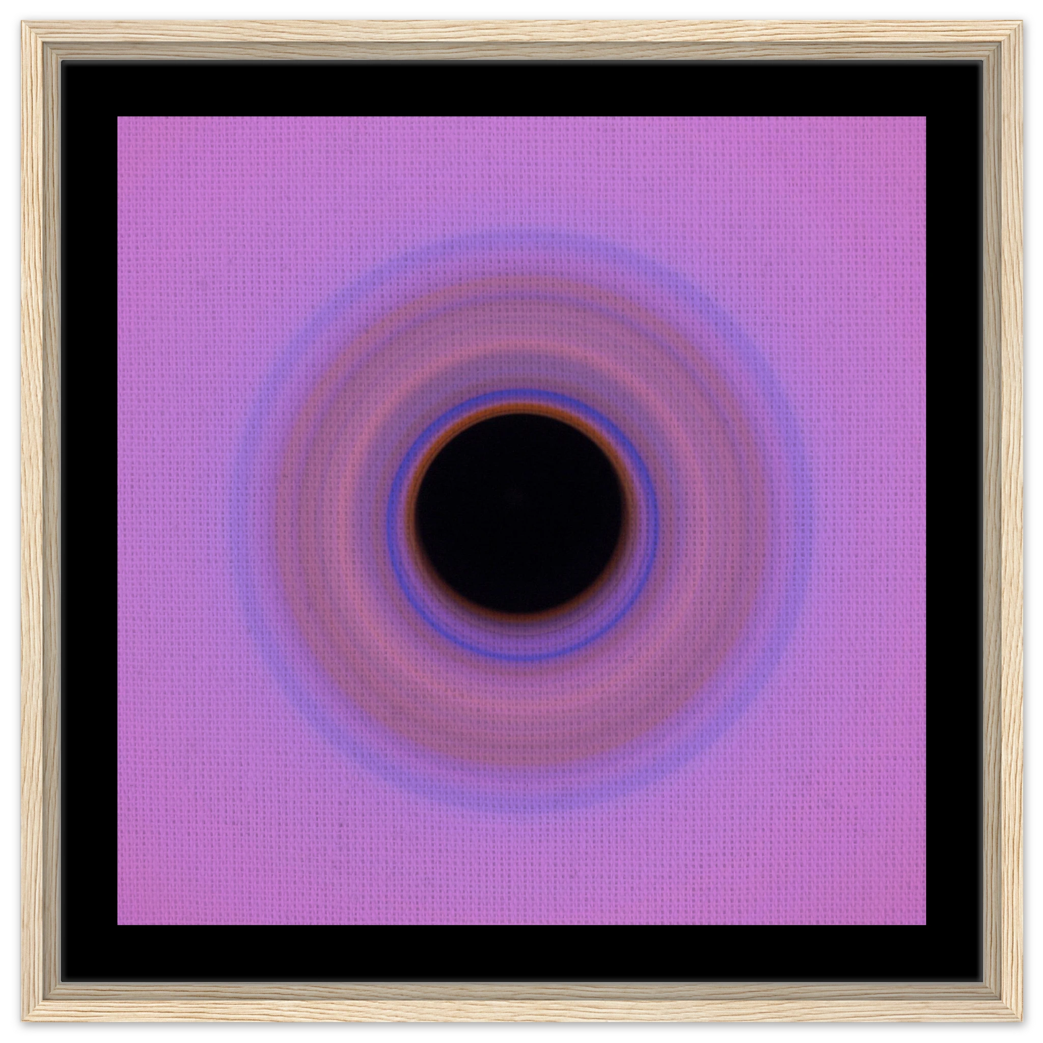 A circular swirl with black center surrounded by concentric rings transitioning from orange through blue and purple to pink at the outer edges.