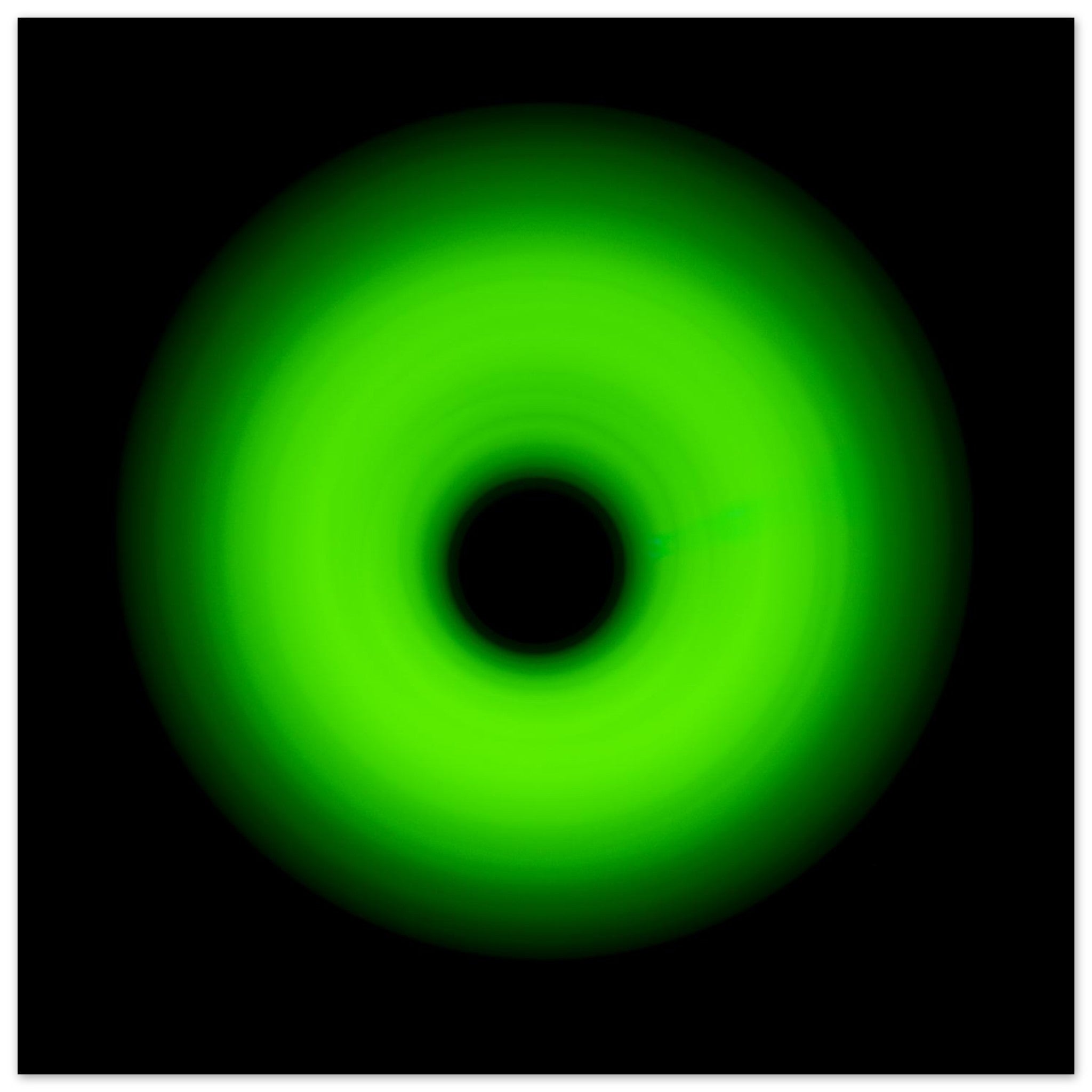 A circular ring of bright lime green light with concentric circles and a glowing center core against a black background.