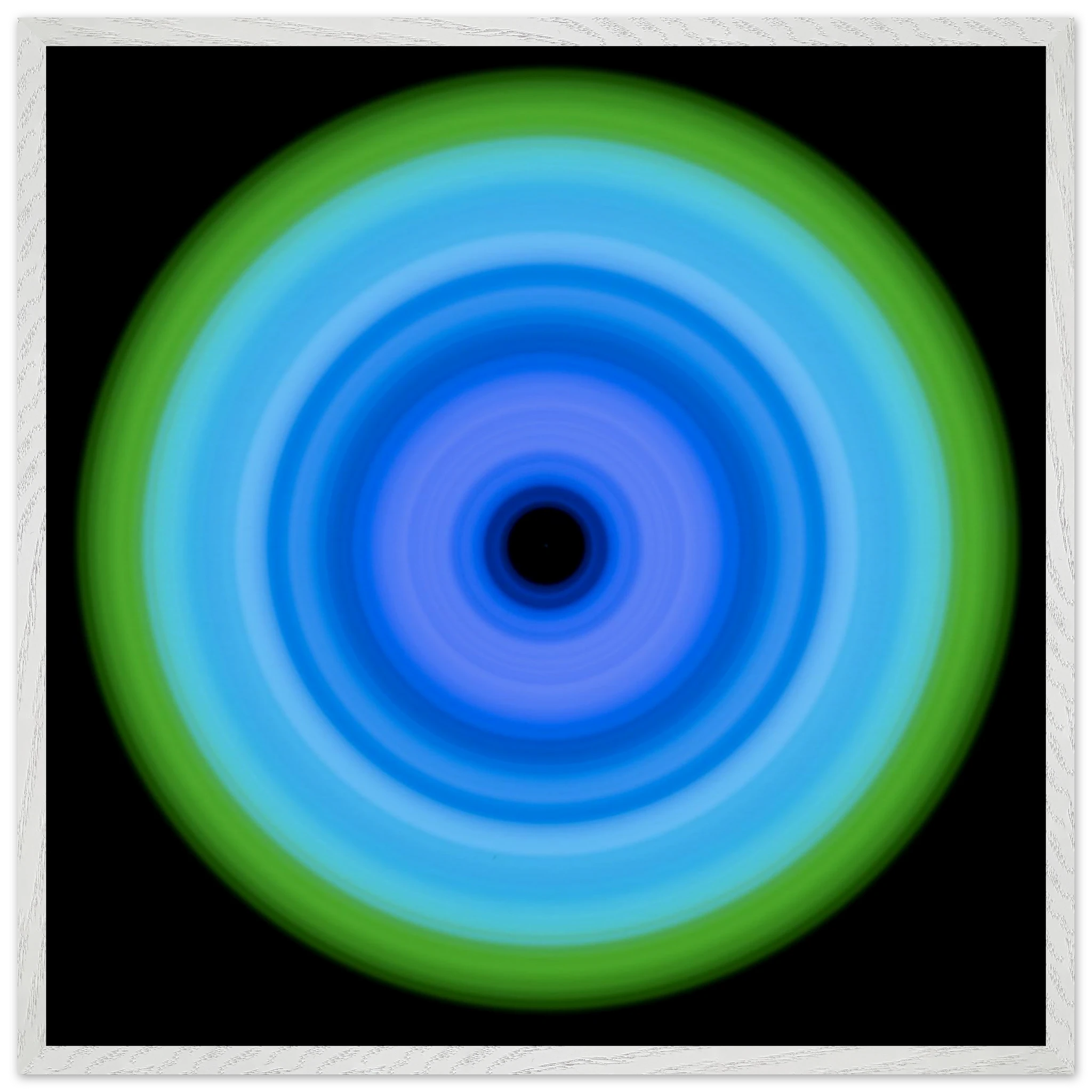 A circular pattern with concentric rings transitioning from a black center through various shades of blue to a lime green outer edge.